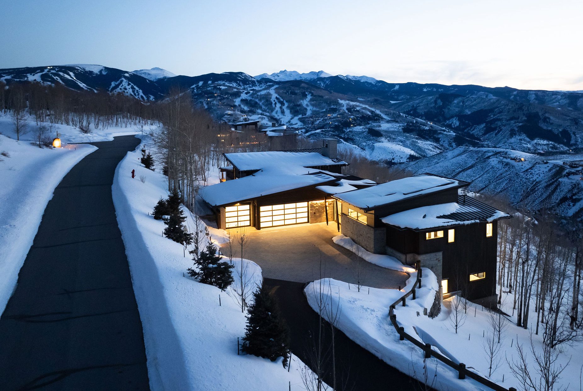 Framing stage of a custom luxury home under construction in the mountains of Avon, Colorado by H&C Construction