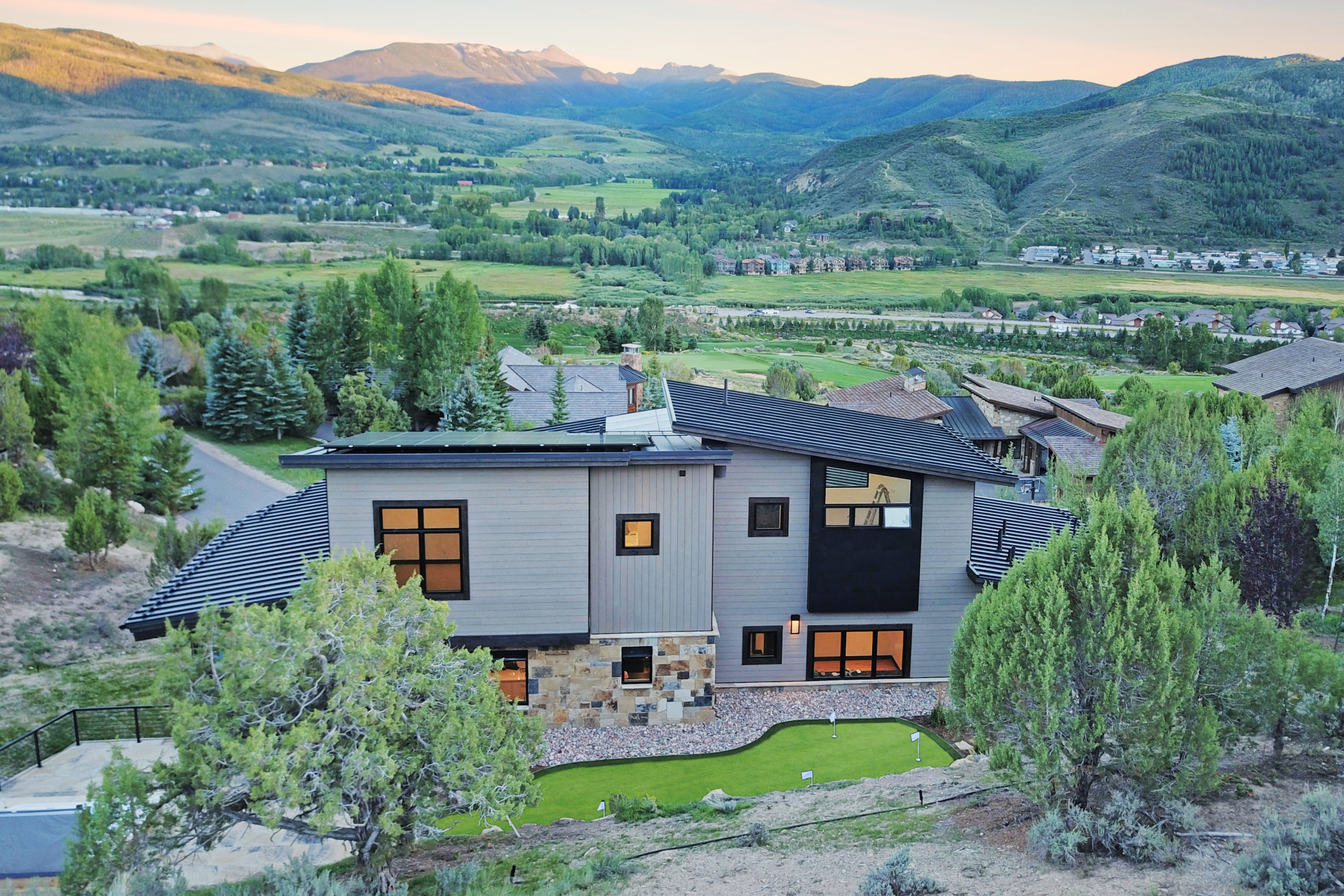 Framing stage of a custom luxury home under construction in the mountains of Avon, Colorado by H&C Construction