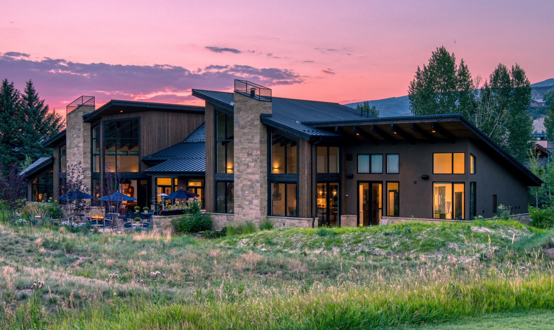 Framing stage of a custom luxury home under construction in the mountains of Avon, Colorado by H&C Construction