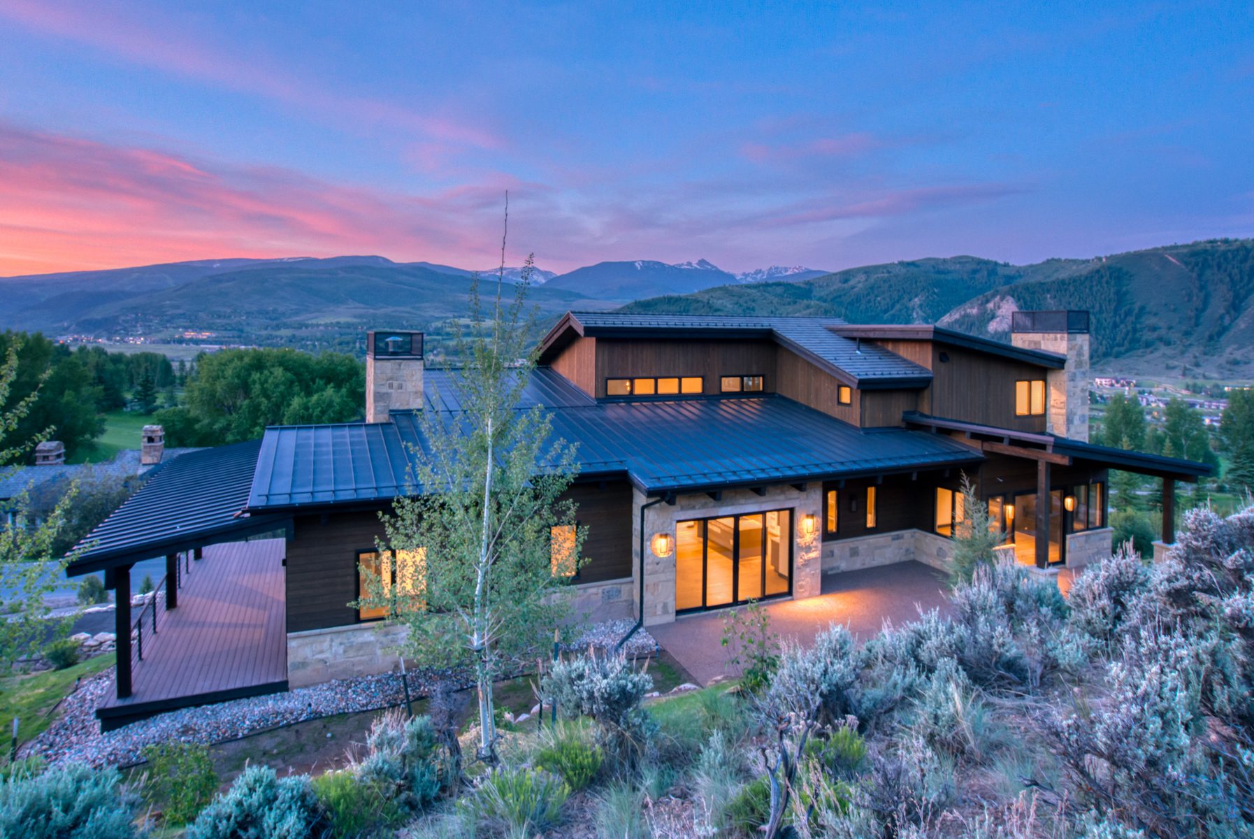 Framing stage of a custom luxury home under construction in the mountains of Avon, Colorado by H&C Construction